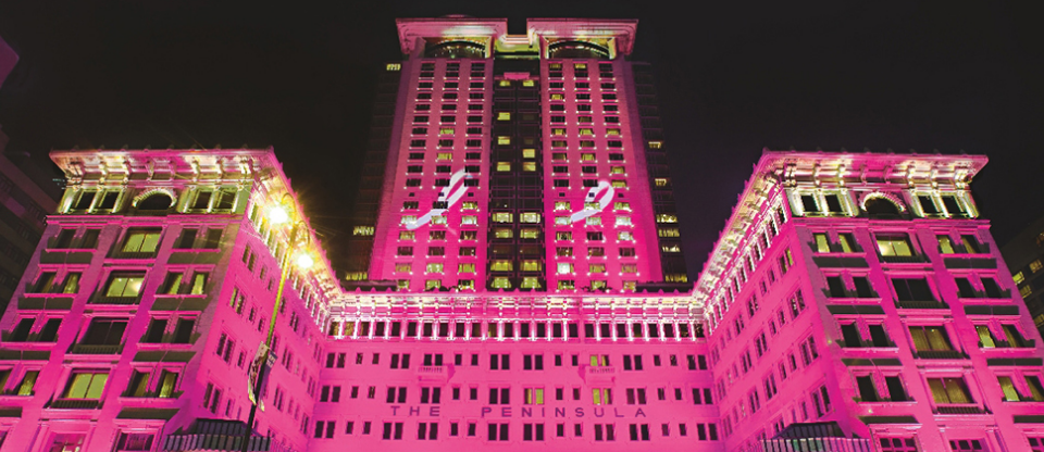 a building with pink lights