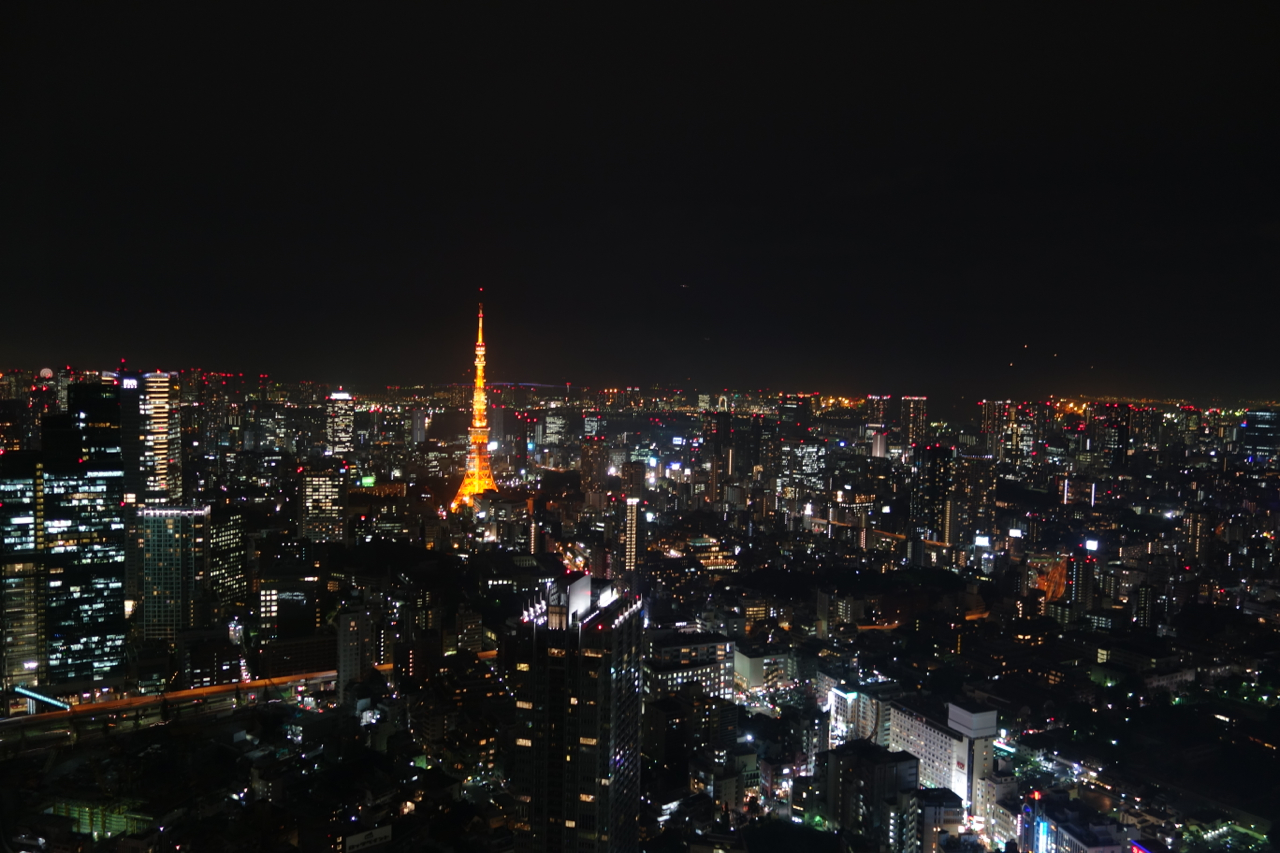 Tokyo Tower at night with a tall tower
