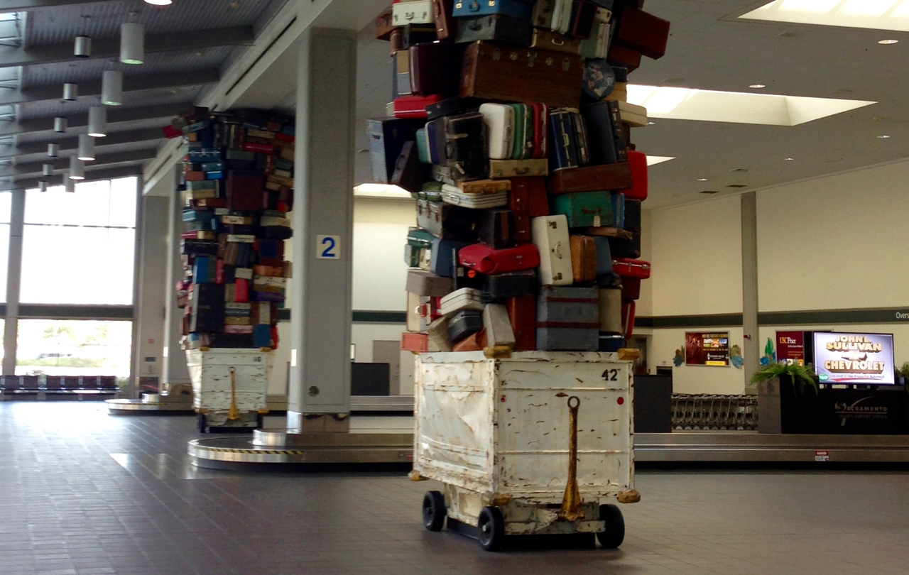 luggage on wheels in a building