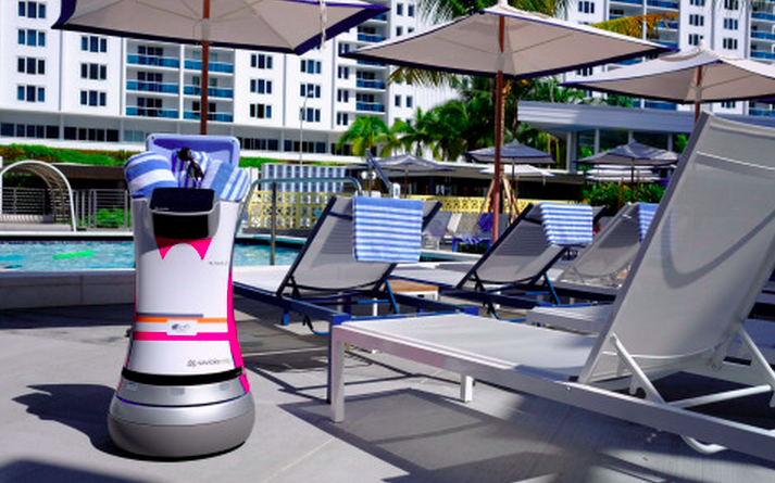 a robot next to a pool