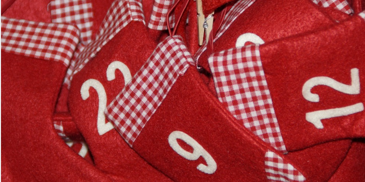 a close-up of a red sweater with white numbers