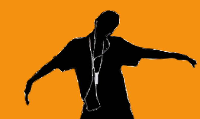 a silhouette of a person with headphones