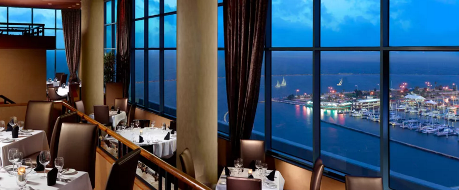 a restaurant with a view of the ocean