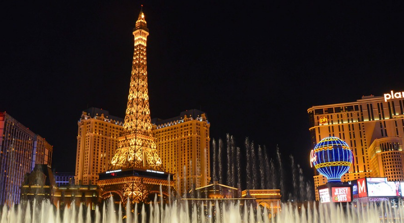 a fountain in front of Paris Las Vegas